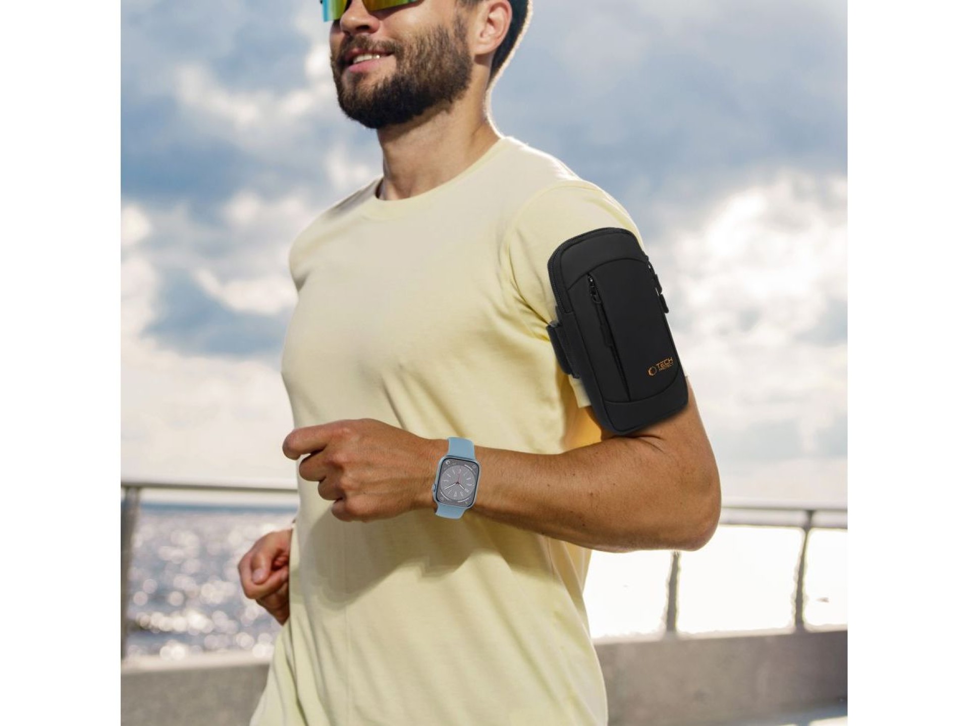 Brazalete deportivo universal Tech-Protect M6 - Negro y naranja