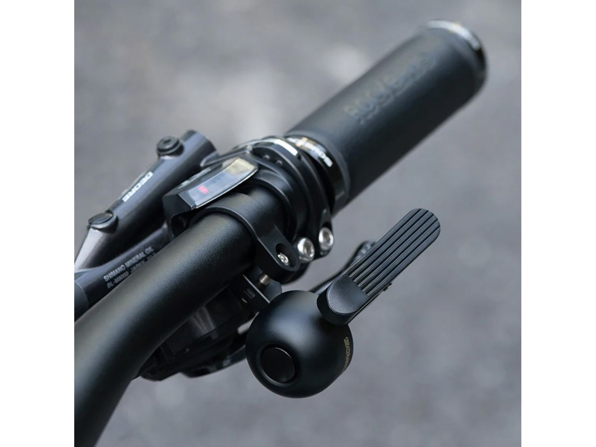 Campainha de bicicleta Rockbros 34210007001 para o lado esquerdo do guidão - preta