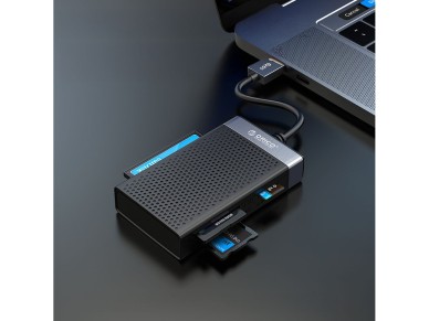 Lector de tarjetas de memoria Orico CL4D-A3 USB-A 3.0 SD microSD CF MS de 5 Gb/s - Negro y plata Lector de tarjetas de memoria Orico CL4D-A3 USB-A 3.0 SD microSD CF MS de 5 Gb/s - Negro y plata